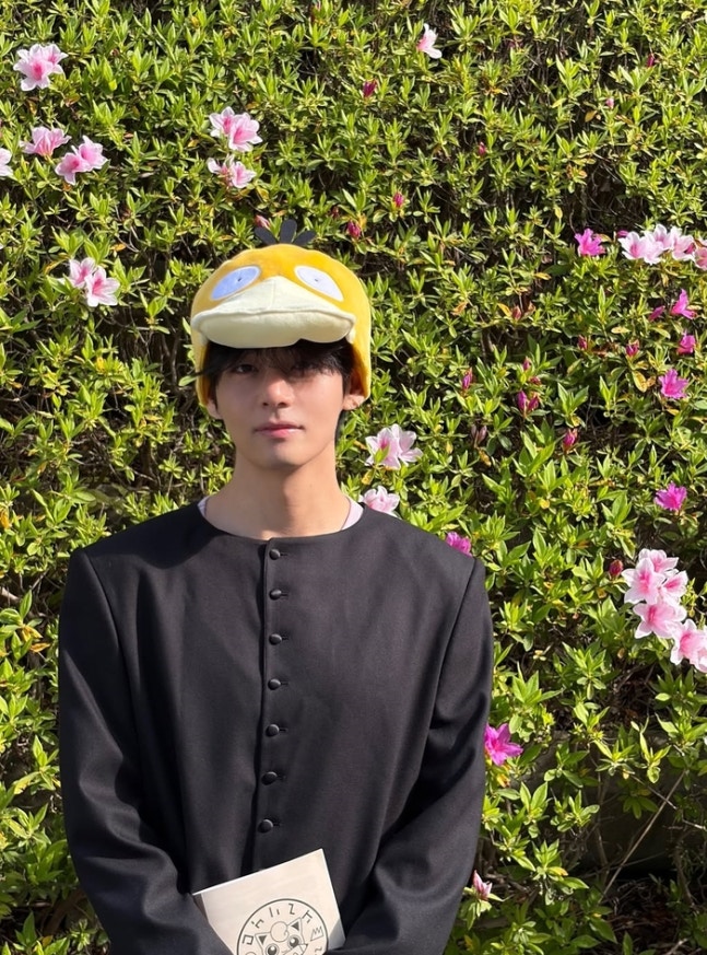 V Reveals His Pokemon Passion: A Fun Moment with Psyduck